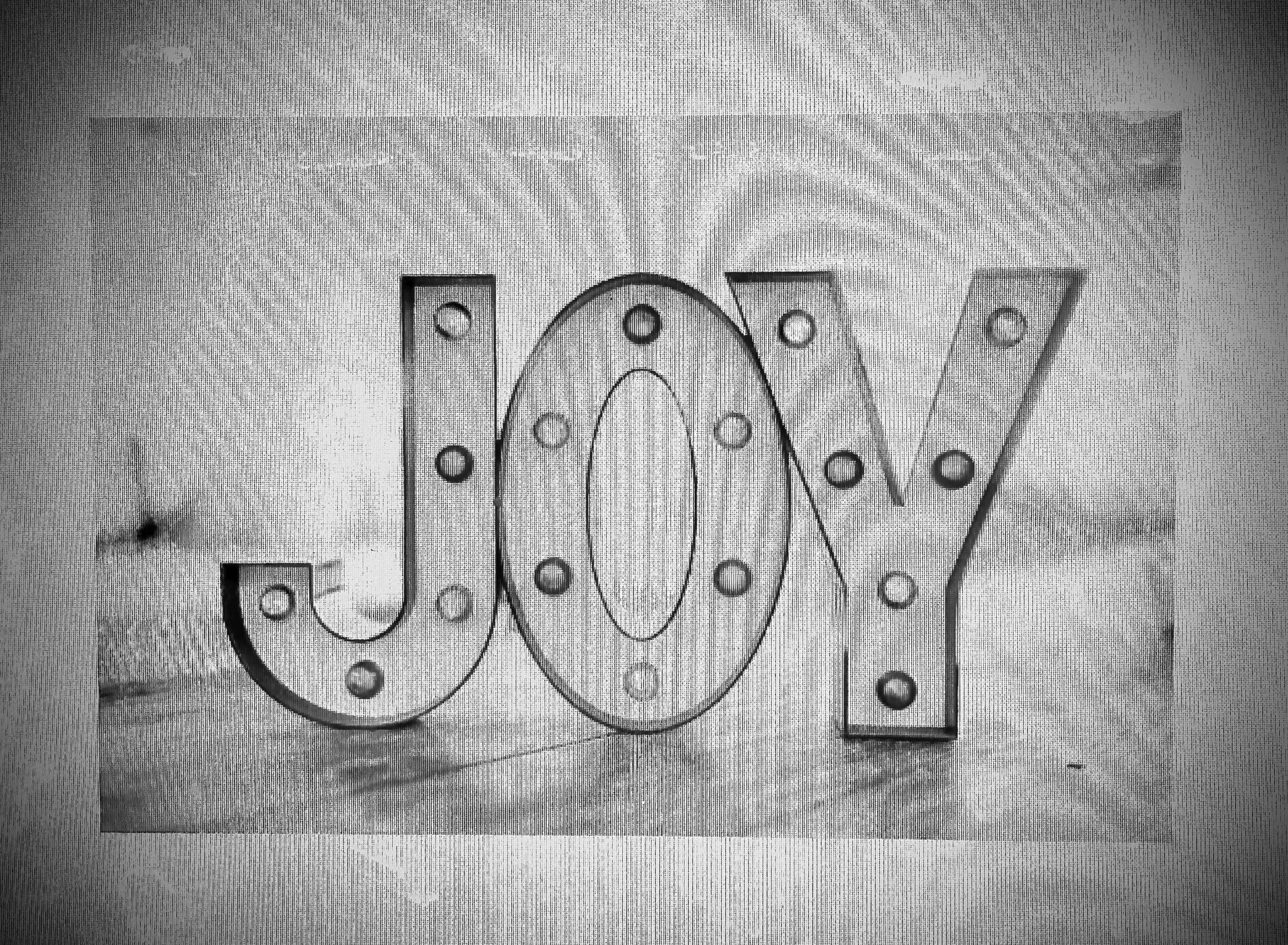 Letters spelling J-O-Y