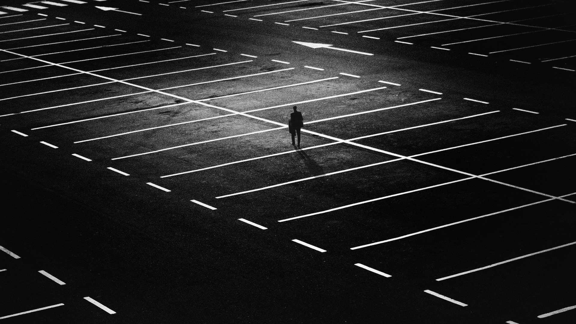 Alone in a nightime parking lot