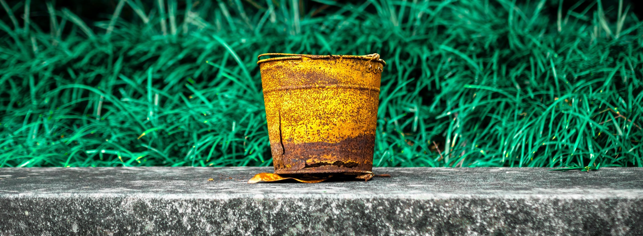 Rusted bucket needs repair so it can be useful