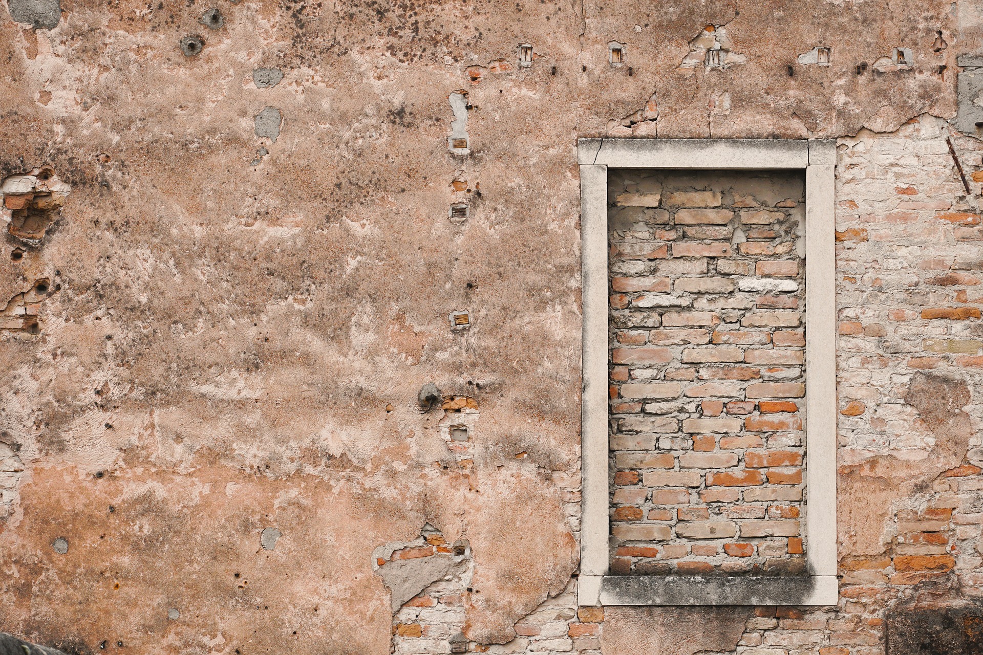 Bricked doorway in a bricked wall