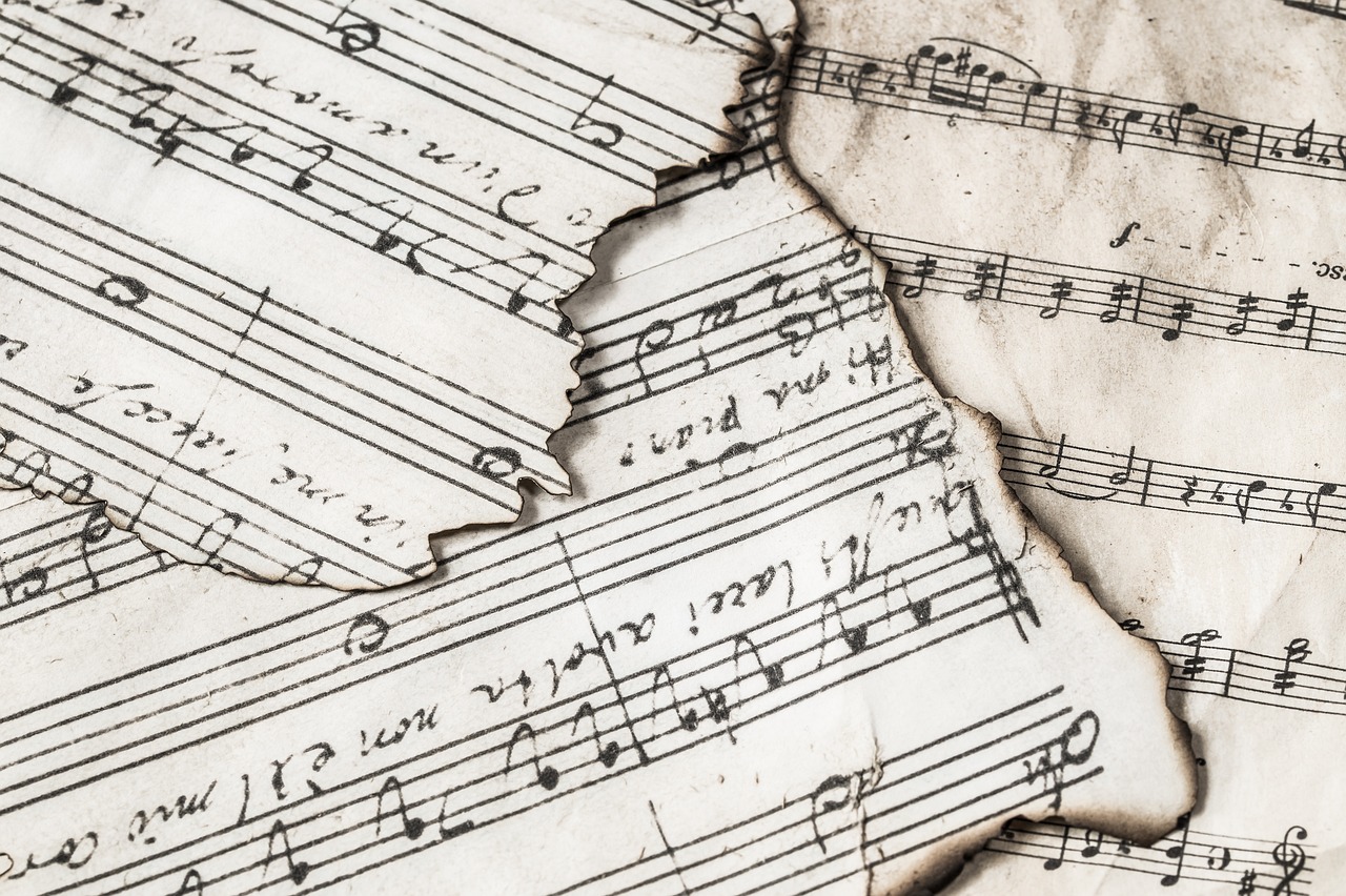 Tattered song sheets of music and notes