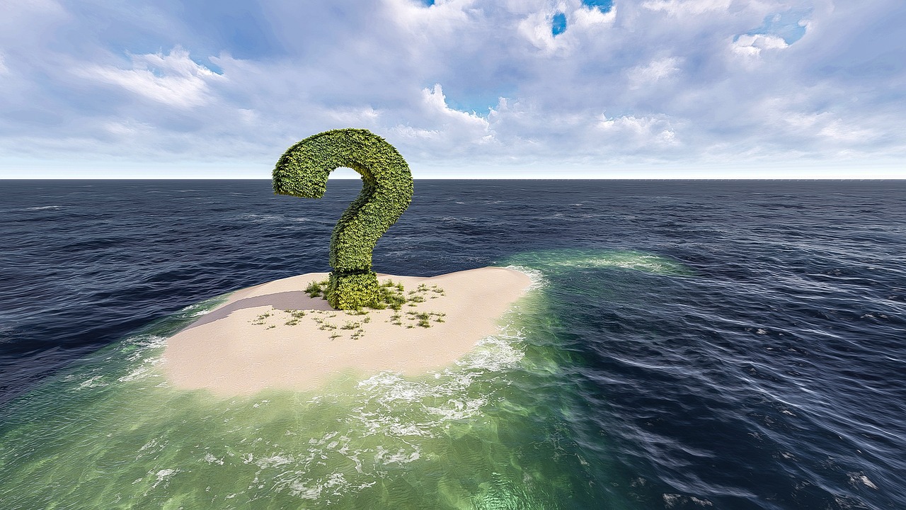 Question Mark on a Sandy Island
