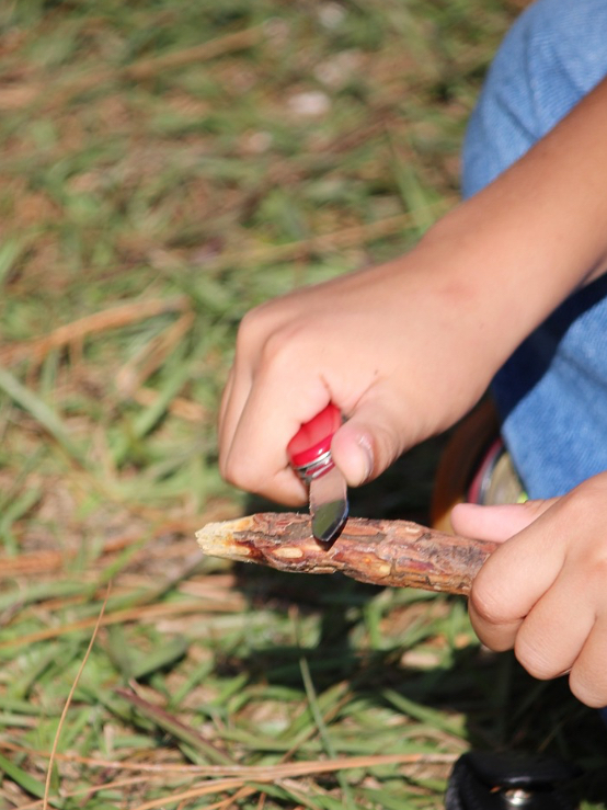 Whittling with a knife