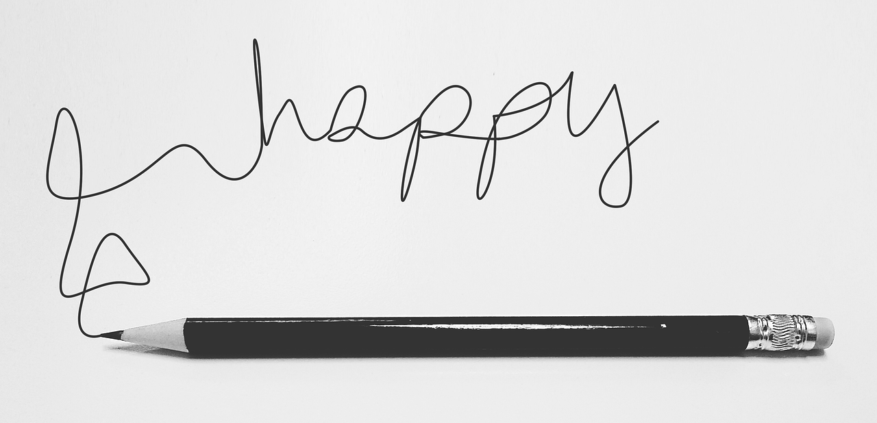 Scribbled pencil marks finally spell happy