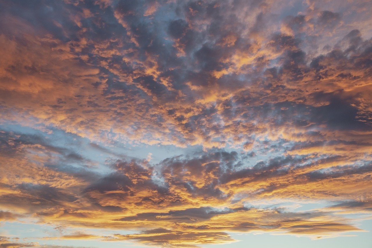 sunset sky with reflecting clouds